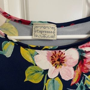 New without tags, navy floral cold shoulder float top. M/L